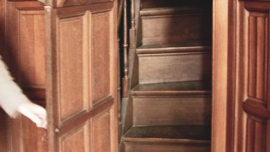 Hidden staircase in a 19th century Victorian home leading to a secret room.